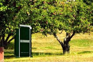 portable toilet in orchard