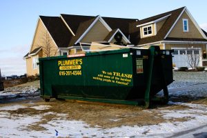 Plummer's dumpster on home construction site